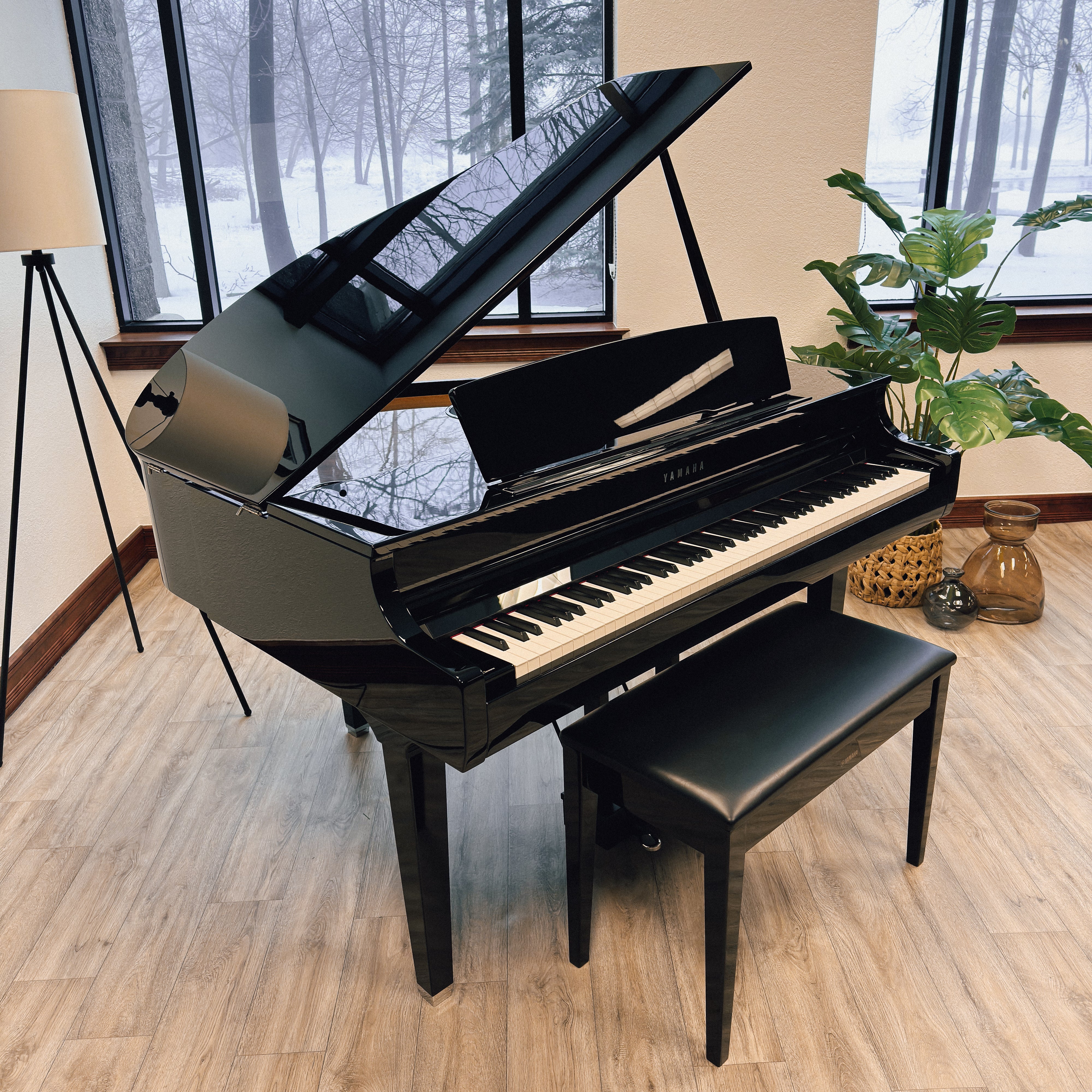 Yamaha Clavinova CSP-295GP Digital Grand Piano - Polished Ebony - in a stylish music room