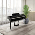 Yamaha Clavinova CVP-909 Digital Piano - Polished Ebony in a room with a plant and large windows