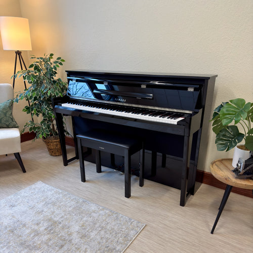 Yamaha AvantGrand NU1XA Hybrid Piano - Polished Ebony - left facing from above in a stylish living space