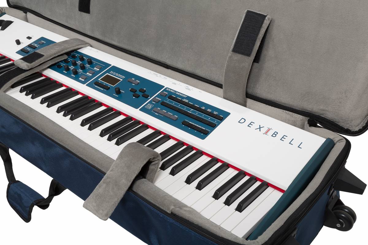 Interior view of Dexibell DX BAGS9S7PRO 88-Key Padded Keyboard Case with Wheels showing keyboard in place (sold separately)