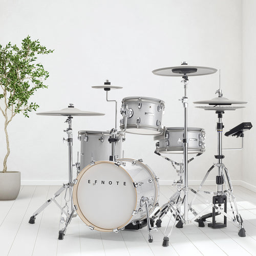 EFNOTE 5 electronic drum set with a white sparkle finish in a stylish living room