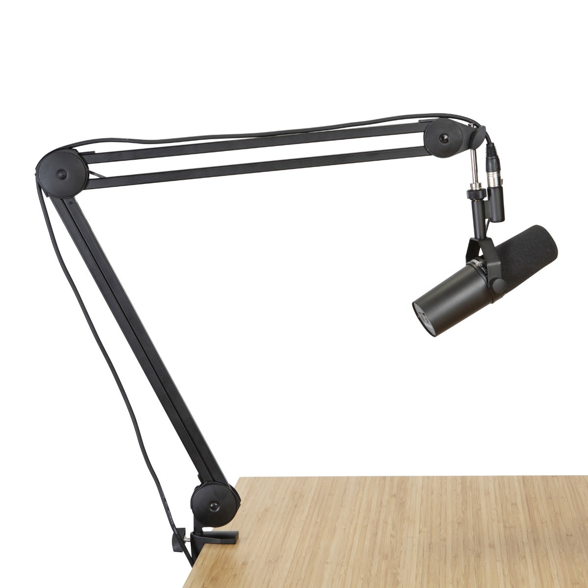 Image of the Gator Frameworks Desktop Mic Boom Stand clamped to a desk