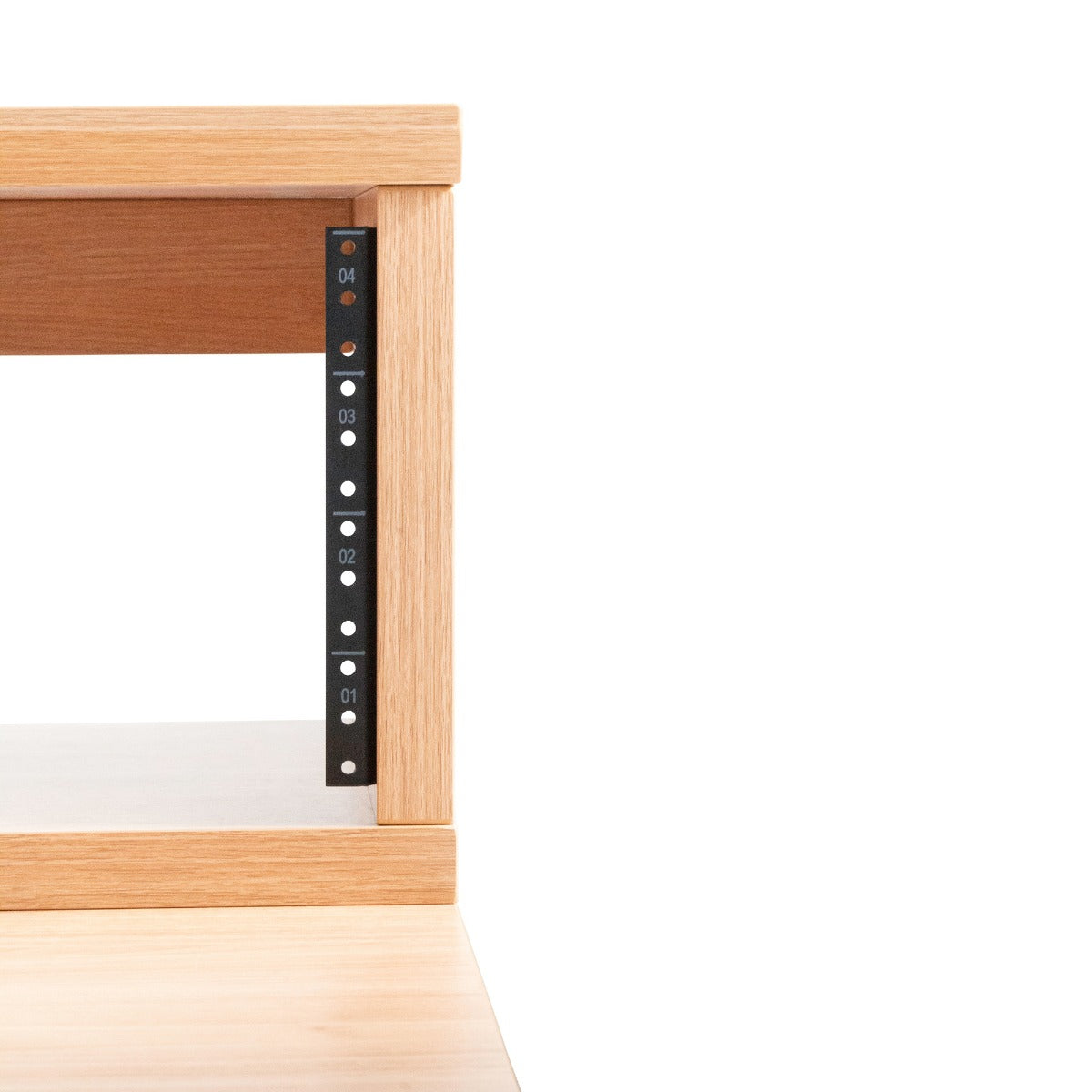 Right side closeup of the 10U rack on the Gator Frameworks Elite Series Furniture Desk - Maple