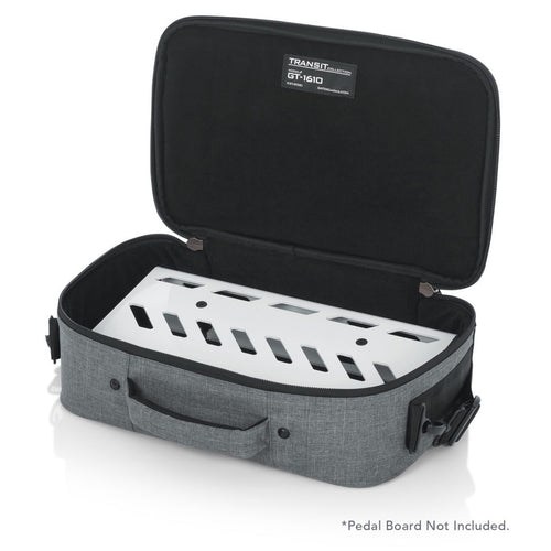 Left angled front of the Gator Cases 16″ X 10″ X 4.5″ Grey Transit Series Accessory Bag with the lid opened and pedal board inside