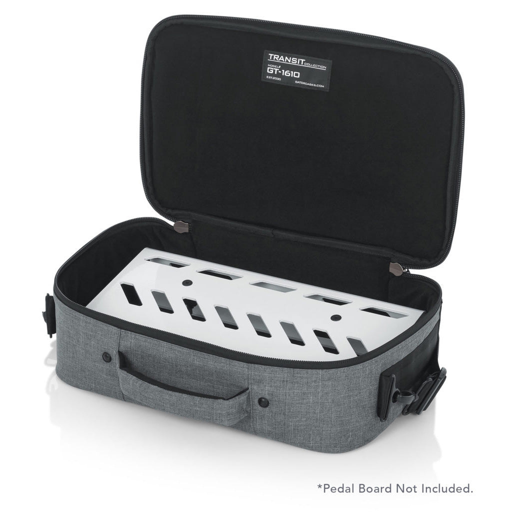 Left angled front of the Gator Cases 16″ X 10″ X 4.5″ Grey Transit Series Accessory Bag with the lid opened and pedal board inside