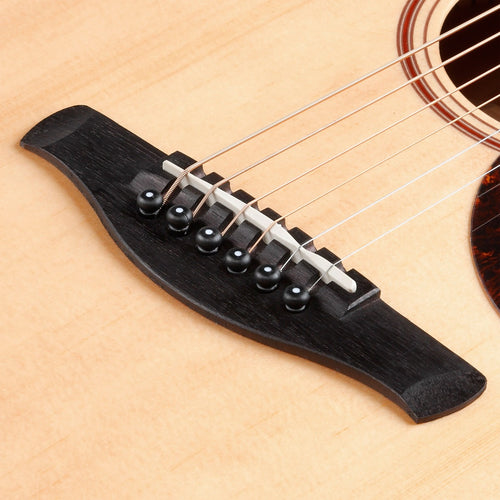 Detail view of Ibanez AAD100E Acoustic-Electric Guitar - Open Pore Natural showing bridge