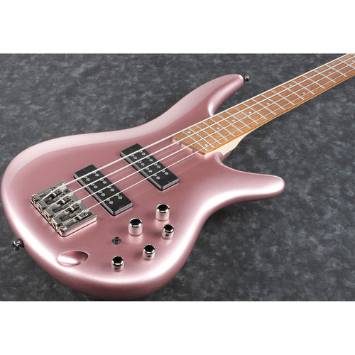 Close-up perspective view of Ibanez SR300E Bass Guitar - Pink Gold Metallic showing top and right side of body and portion of fingerboard