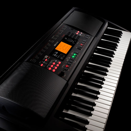 3/4 view of Korg EK-50 L Entertainer Keyboard showing top, left edge and front edge