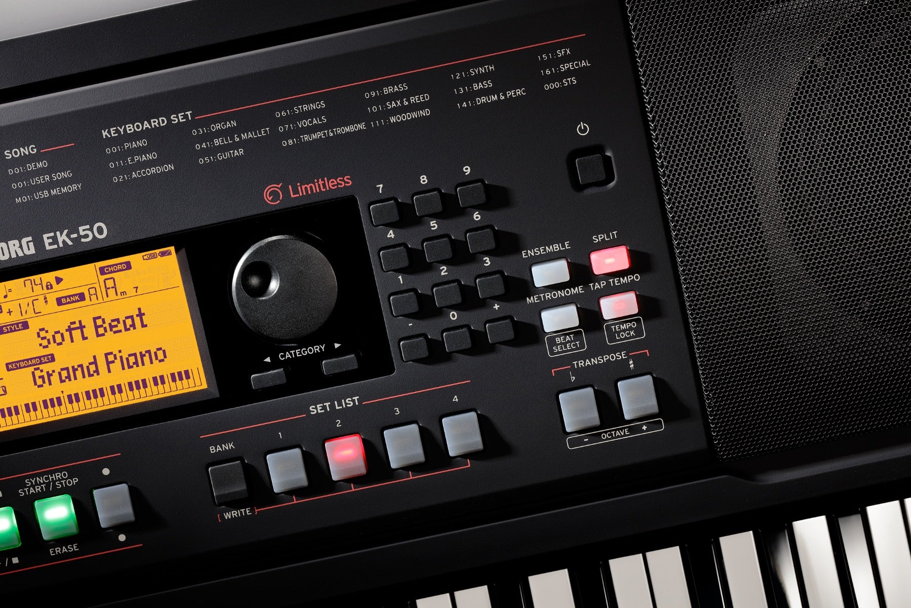 Detail image of Korg EK-50 L Entertainer Keyboard top panel showing screen, encoder wheel, buttons and right speaker grille