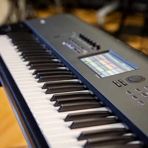 Close-up angle shot of the Korg Nautilus 88-Key Music Workstation in a studio setting