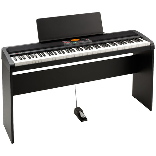 3/4 view showing top, front and left side of Korg XE20 Home Digital Ensemble Piano with stand, music stand and sustain pedal