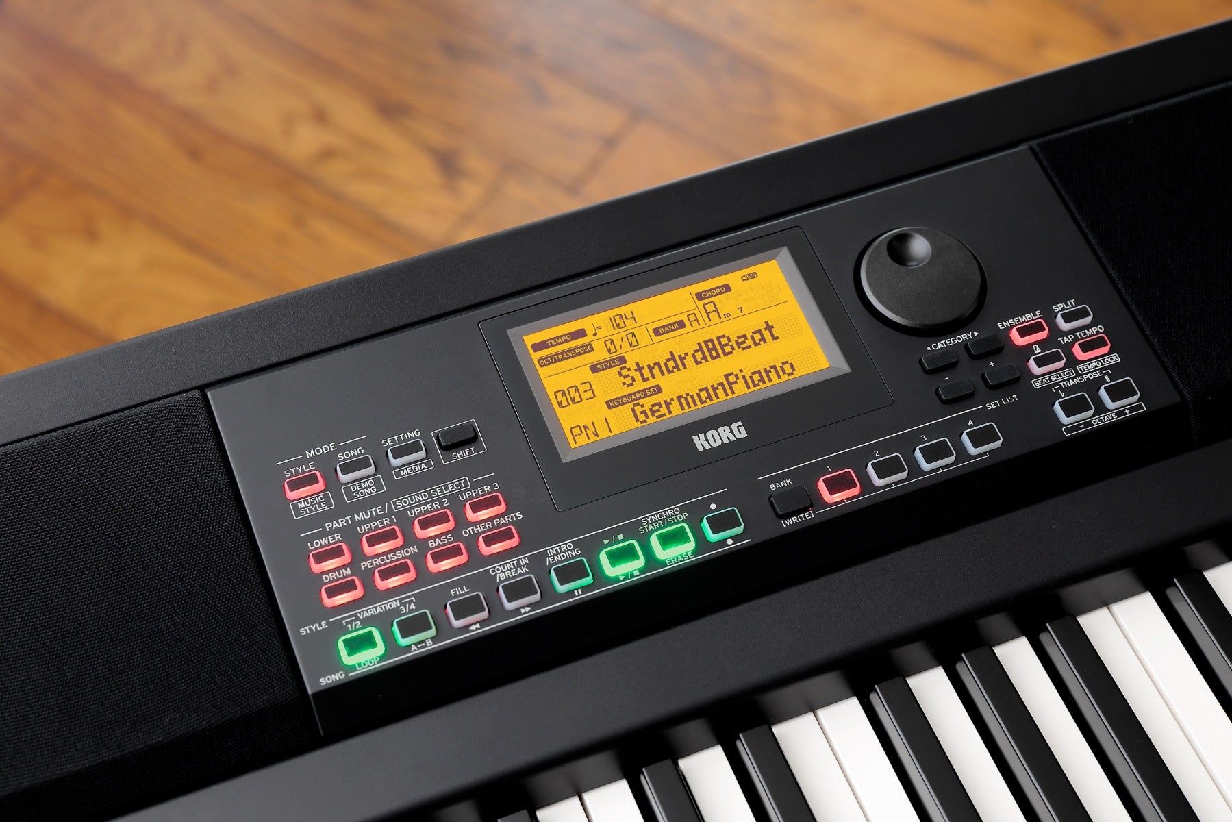 Detail view of Korg XE20 Home Digital Ensemble Piano showing control panel and screen