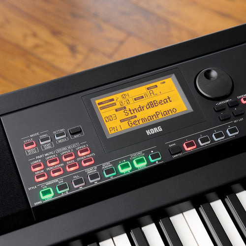Detail view of Korg XE20 Home Digital Ensemble Piano showing control panel and screen