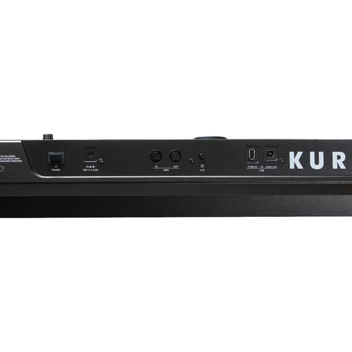 Detail rear view of Kurzweil PC4-7 76-Key Workstation Keyboard showing MIDI and USB connections