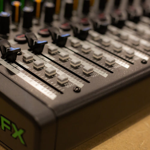 Close up view of the faders for the Mackie ProFX16v3 Effects Mixer with USB