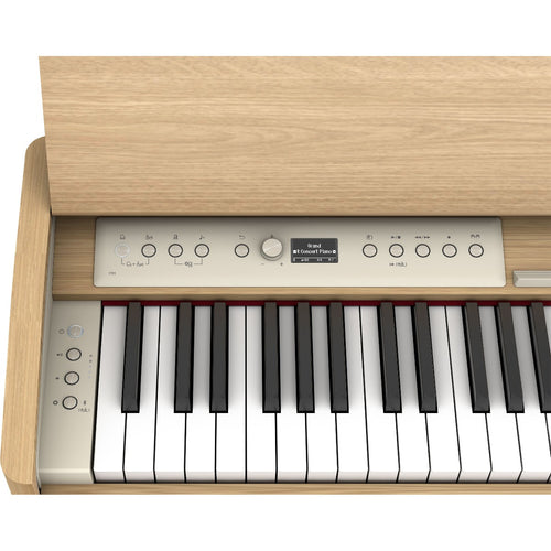 Close-up view of Roland F701 Digital Piano - Light Oak showing controls and portion of keyboard