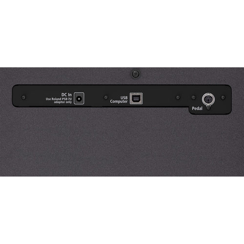Detail underside view of Roland F701 Digital Piano - WhiteBlack showing power, USB and pedal connectors