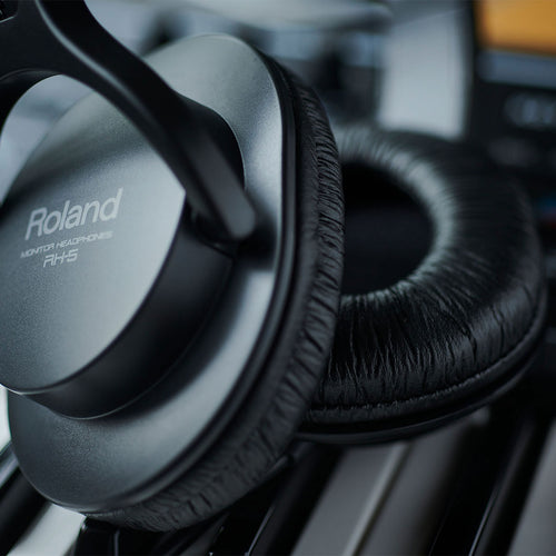 Lifestyle image of the Roland RH-5 Stereo Headphones - Black, focusing on the ear cups