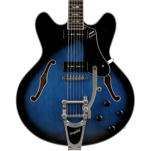 Close-up top view of Vox Bobcat V90 Bigsby Semi-Hollow Electric Guitar - Sapphire Blue showing body and portion of fingerboard