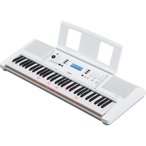 3/4 view of Yamaha EZ-300 Portable Keyboard with music rest attached showing top, front and right side