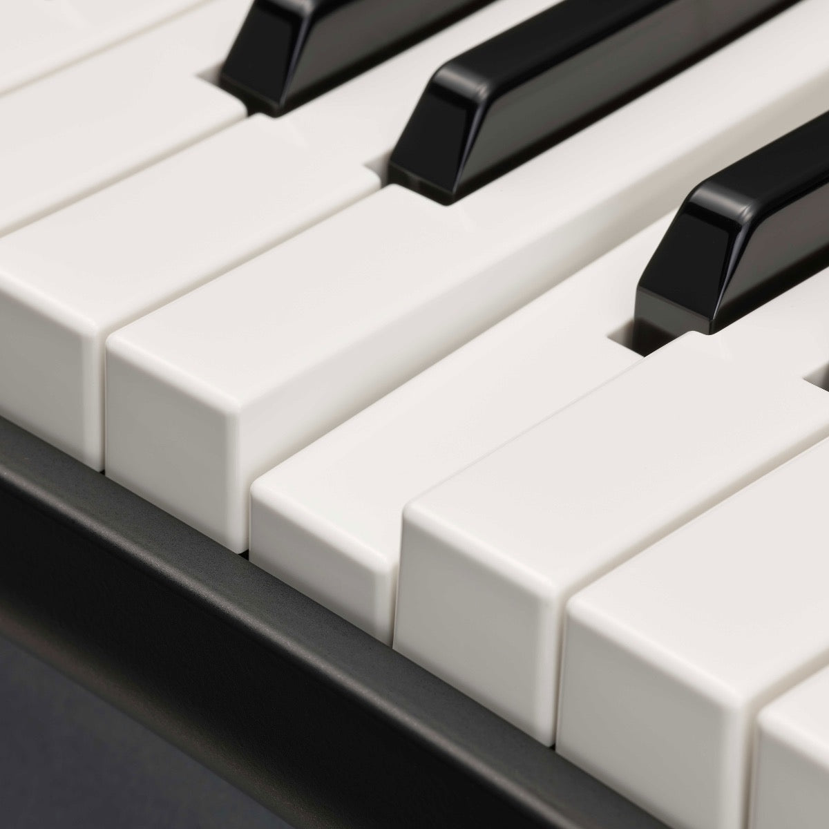 Detail view of Yamaha YC61 61-Key Stage Keyboard and Organ showing portion of keybed with one key depressed