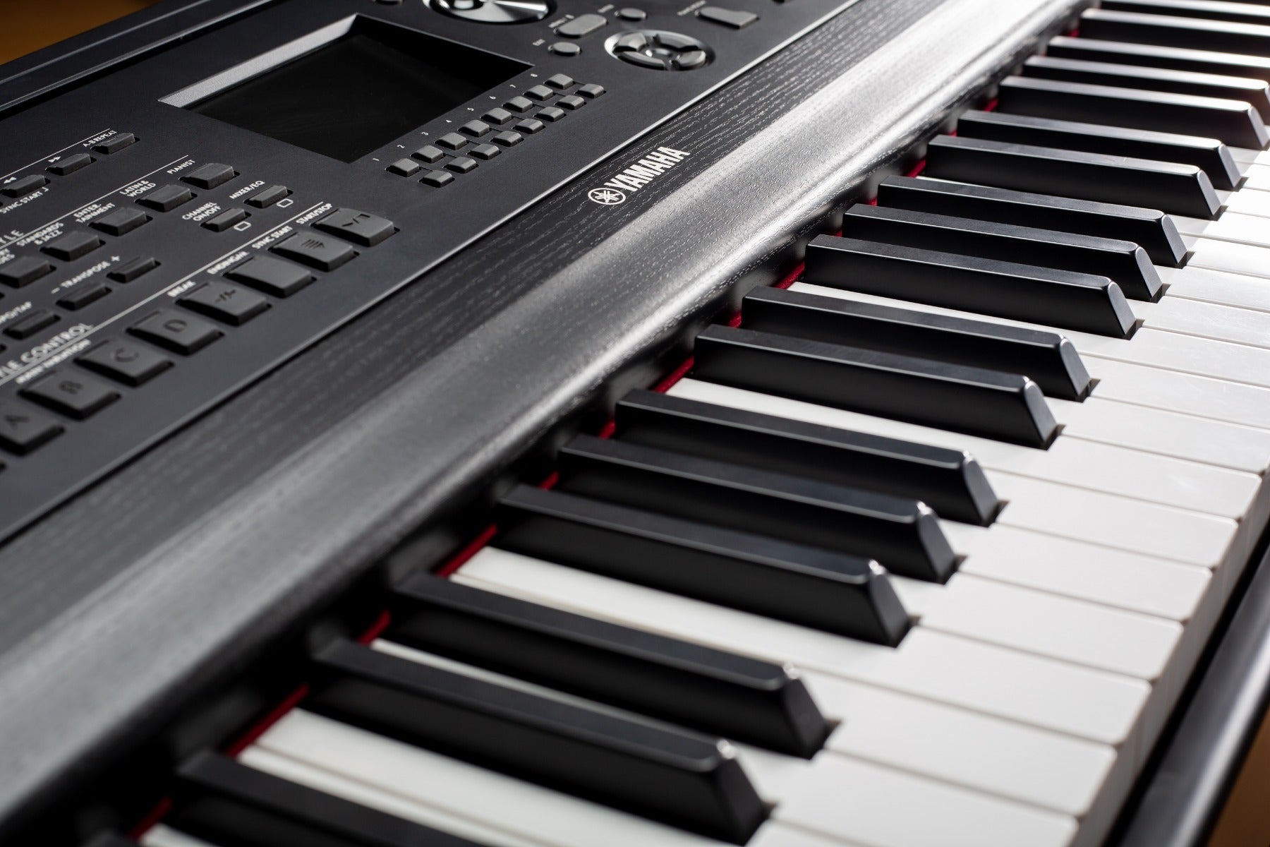 Close-up angle keyboard view of the Yamaha DGX-670